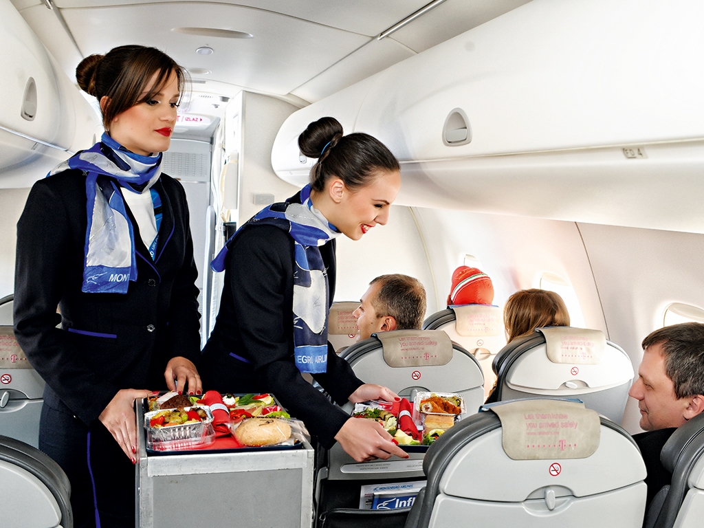 Cabin crew on board a Montenegro Airlines flight