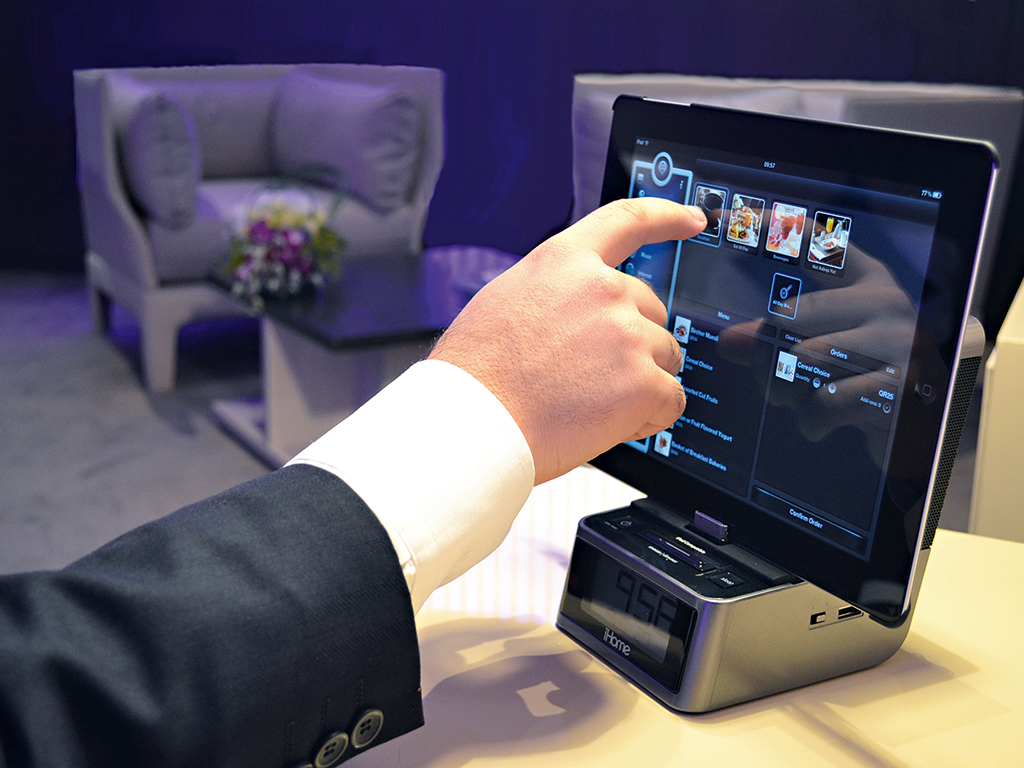 The in-room iPads allows guests to control their environment, find entertainment, check in, and more