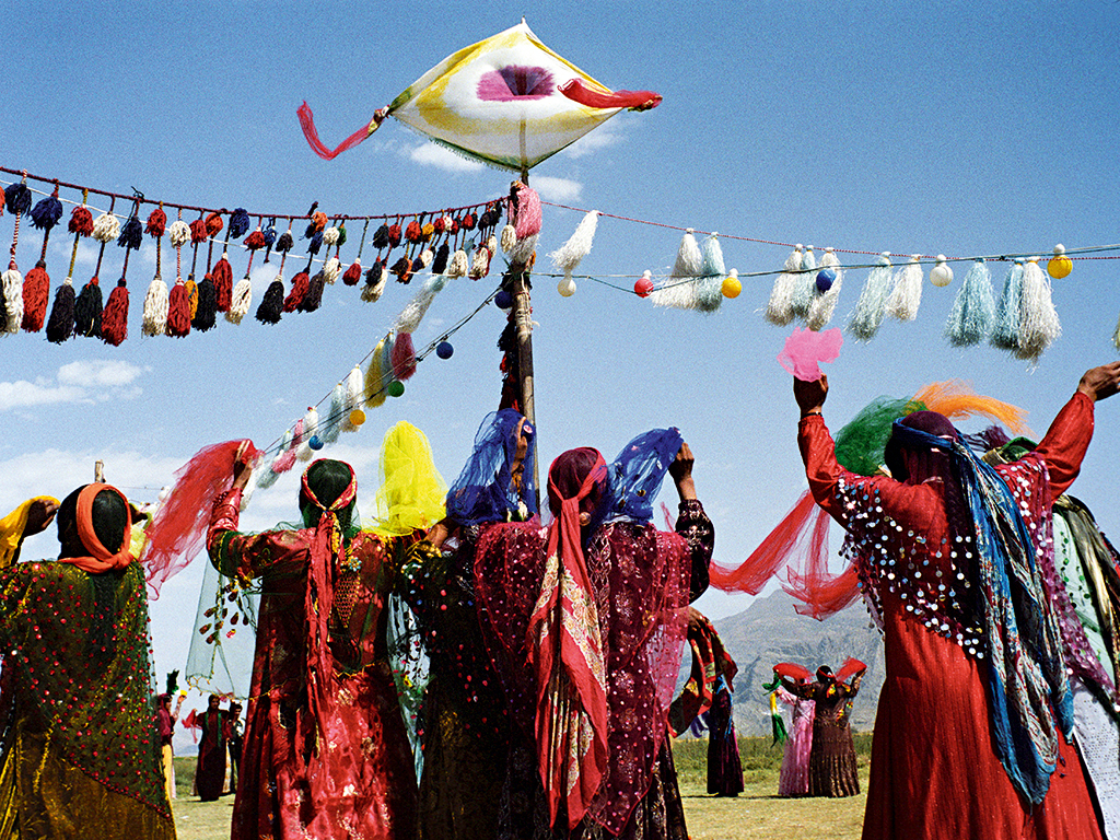 Qashqai women dance during a wedding ceremony