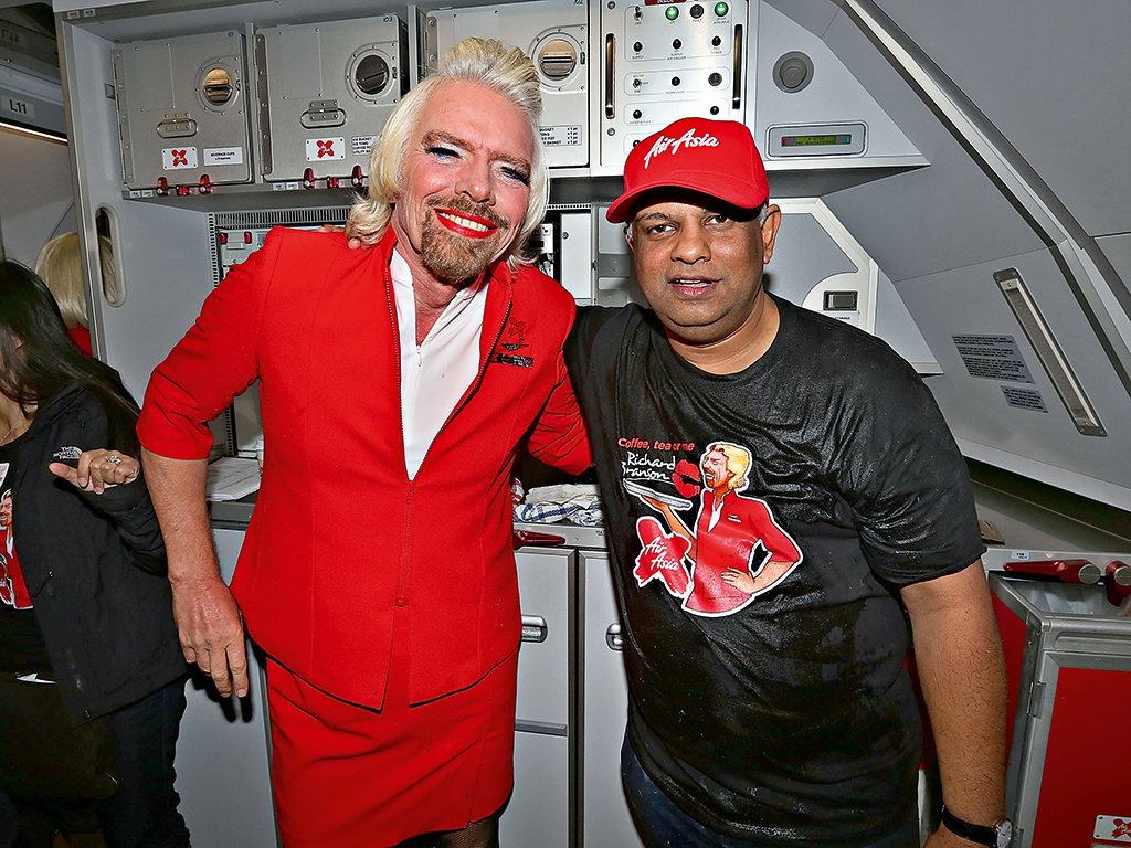 After losing a bet against Fernandes, Richard Branson had to dress as an air stewardess and work onboard an AirAsia flight 