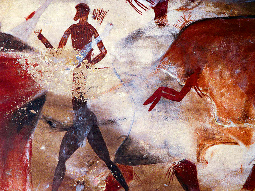 of a cave in South Africa's Drakensberg mountains. The paintings may have been made at least 2,000 years ago. The images are typical of scenes involving shamanism