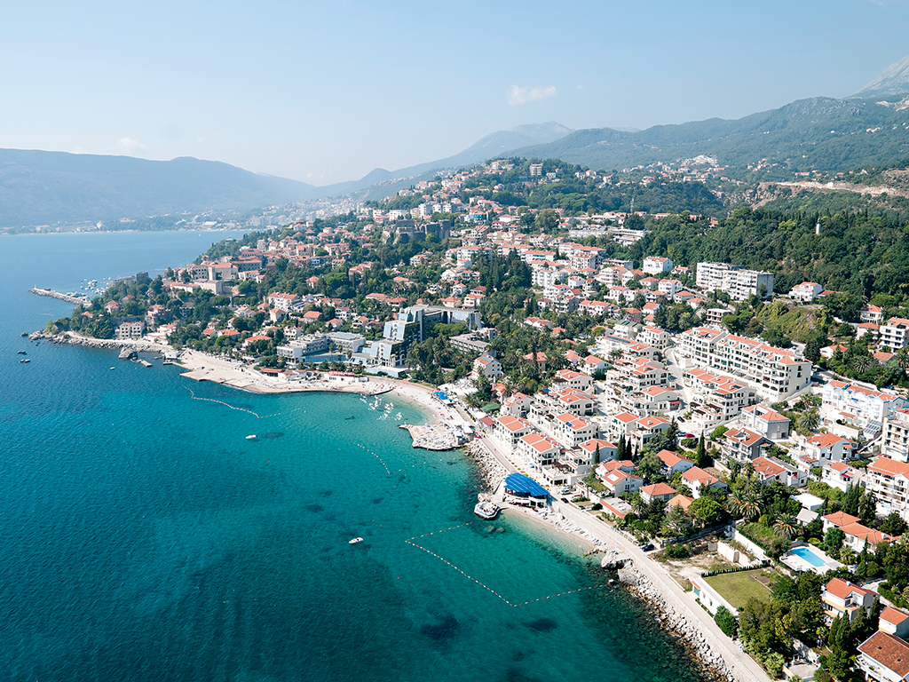 An aerial view of Herceg Novi, with historical medical town Igalo in the distance