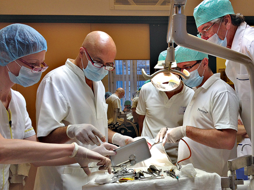 Prof Idhe with his team of implantology experts. His clinic Simpladent specialises in providing world-class dental implants