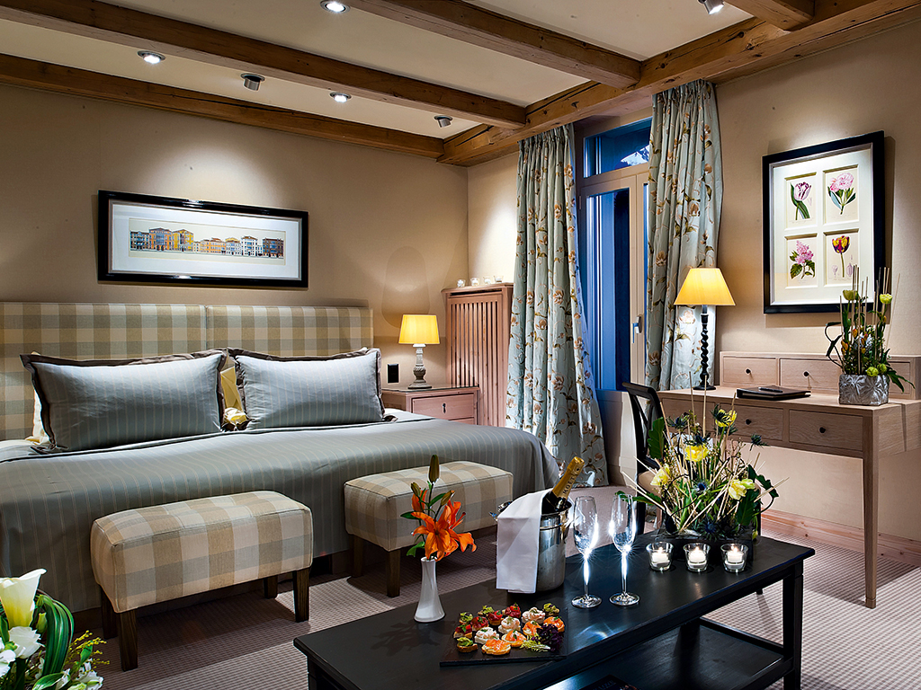 A bedroom at the Gstaad Palace. The hotel offers guests world-class comfort, and also has a number of facilities for hosting events