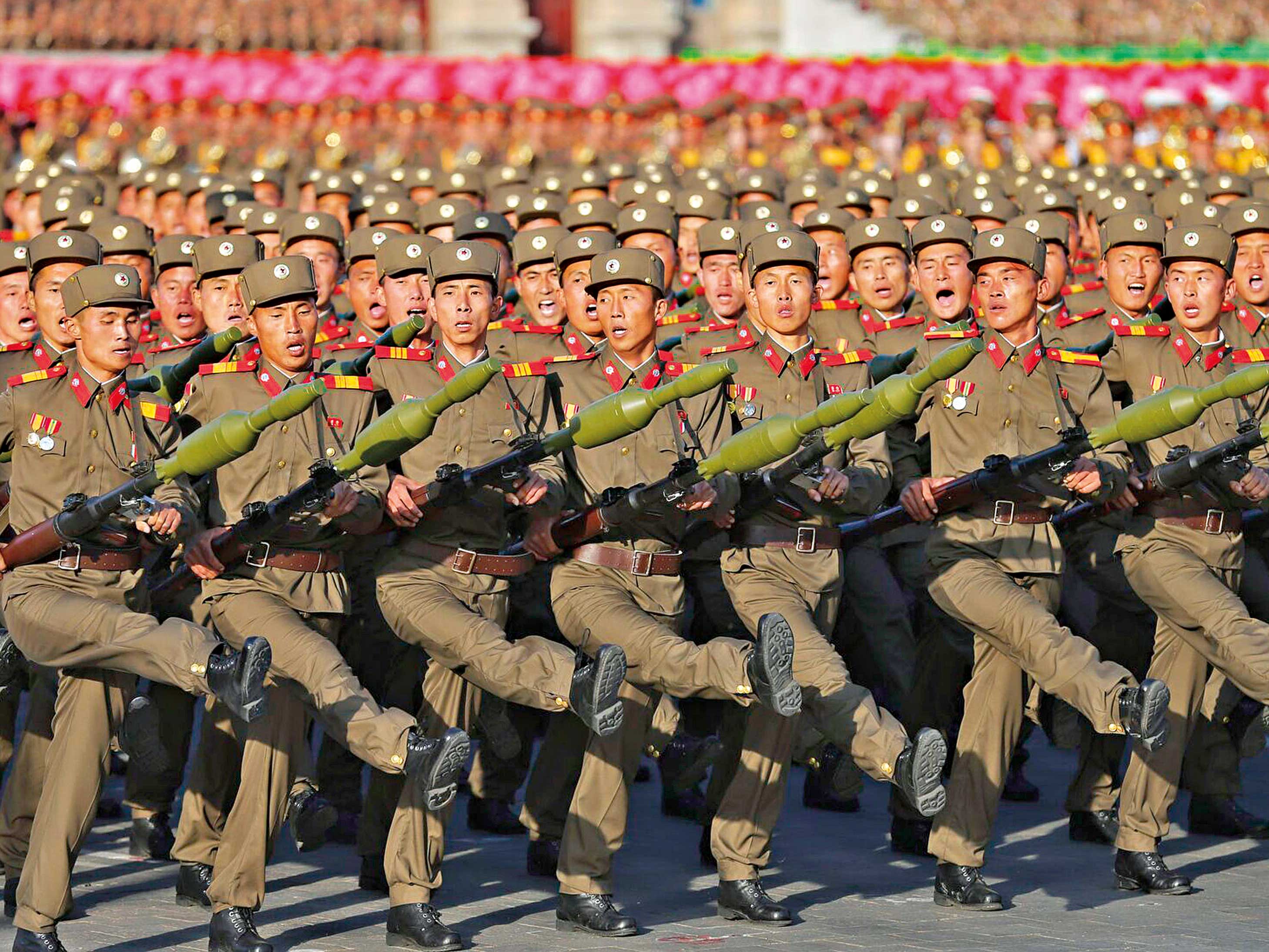 The North Korean army displays its infamous goose step march