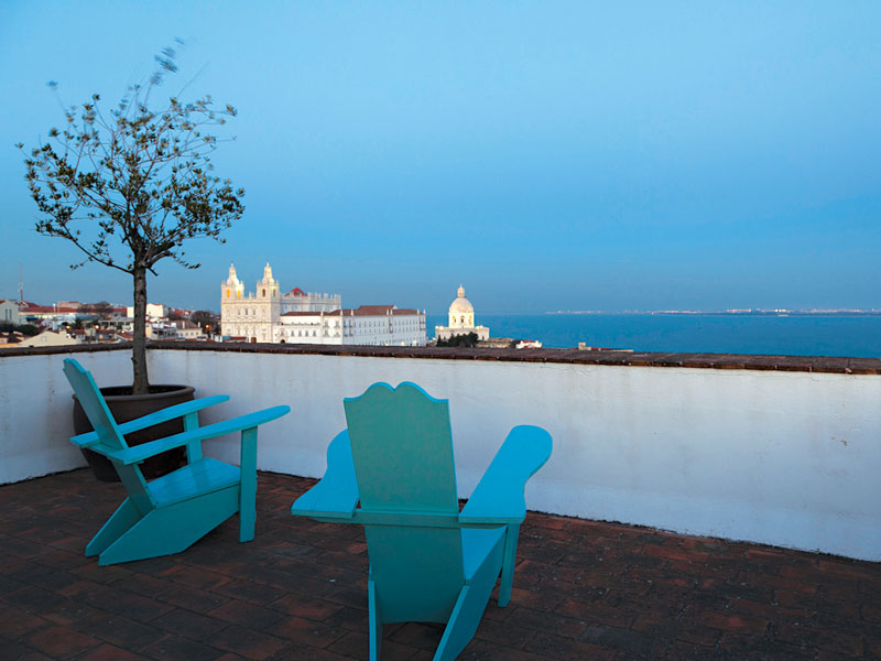 Palacio Belmonte's Bartolomeu de Gusmão terrace suite offers expansive views of the Alfama district of Lisbon and the river Tejo